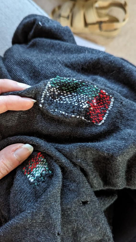 visible darning as a political statement