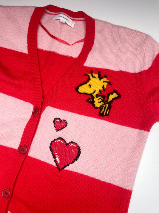 visible creative mending using swiss darning snoopy cardigan repair