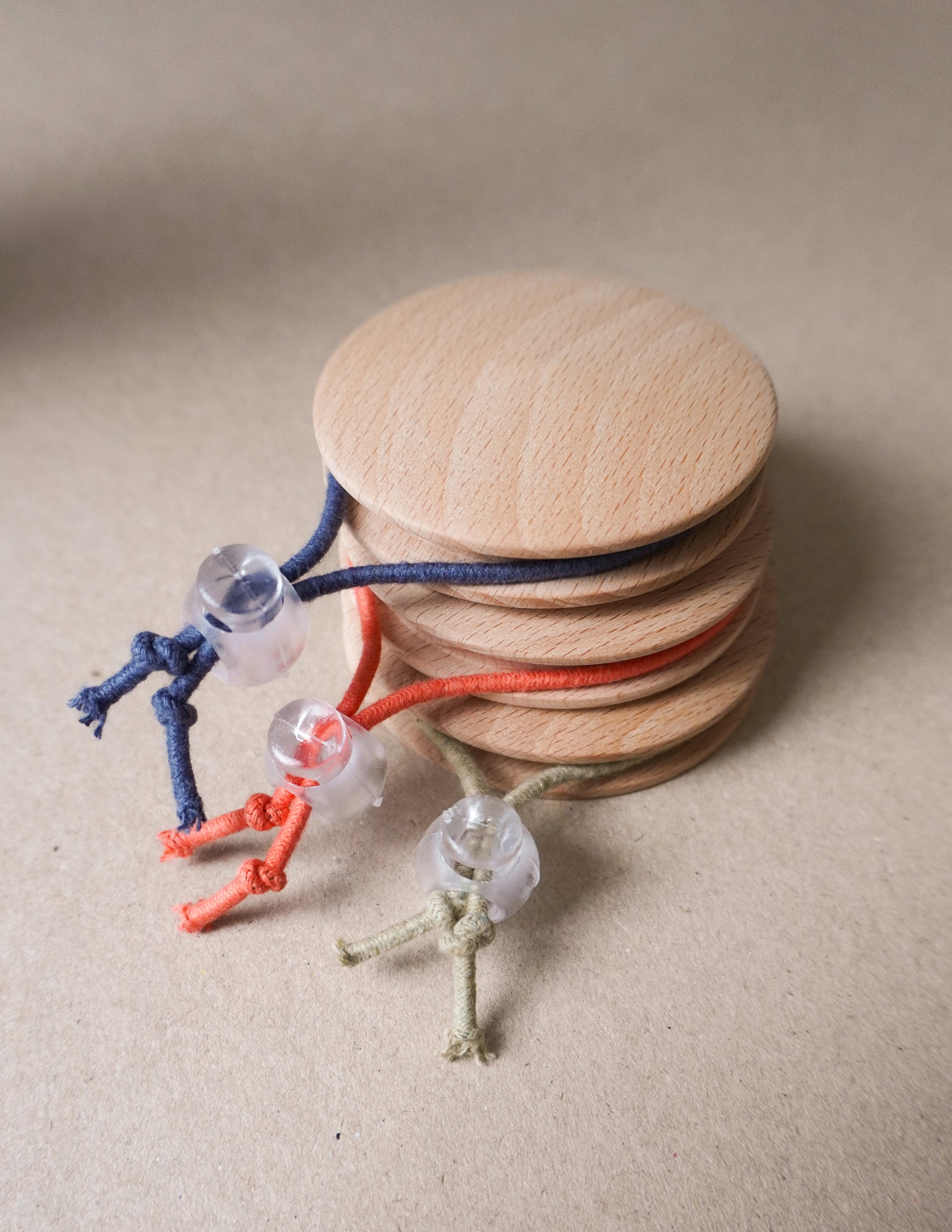 handmade wooden darning disc with elastic tie for visible mending and darning skye pennant slow stitch club
