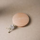 handmade wooden darning disc with elastic tie for visible mending and darning